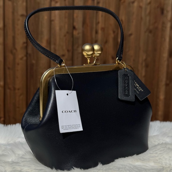 Coach Handbags - LIMITED EDITION COACH Kisslock Frame Bag 16 Glovetanned Leather Purse